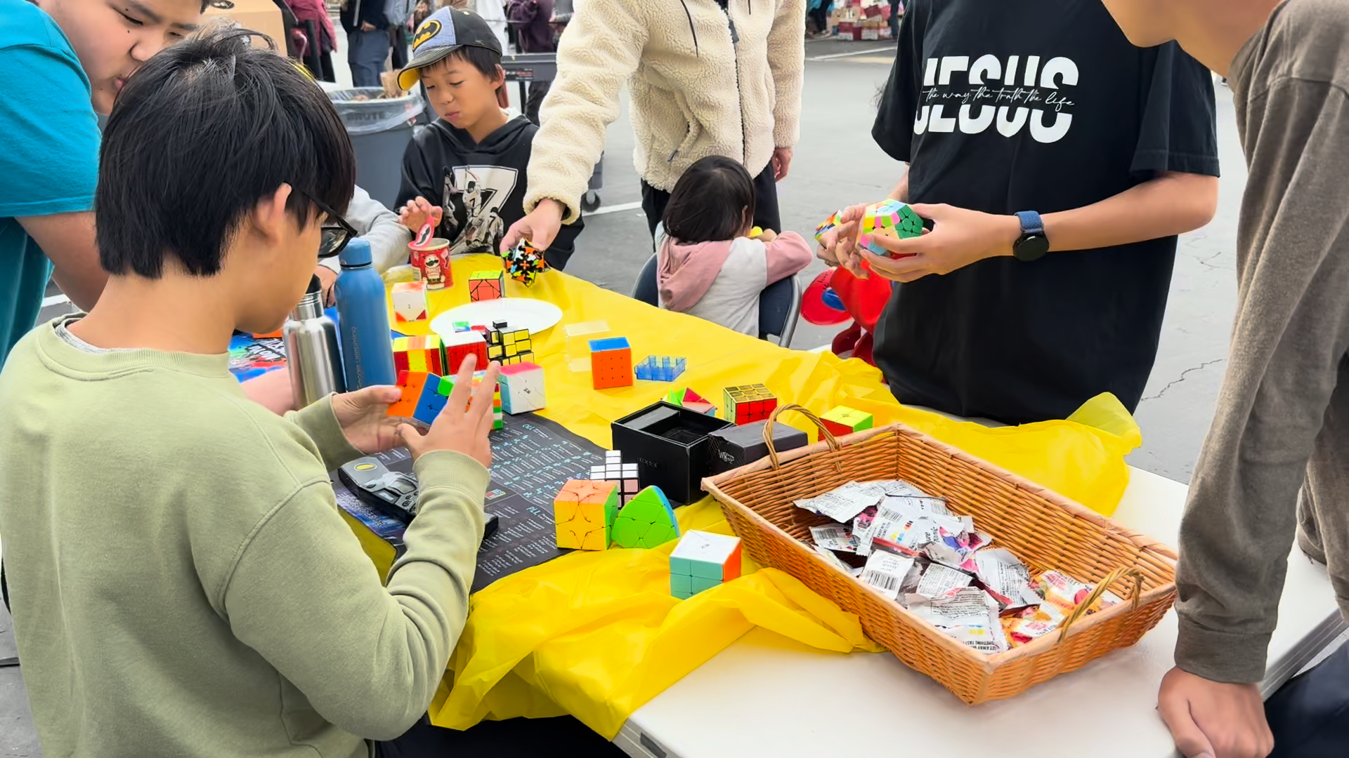 Kids at a craft and game booth